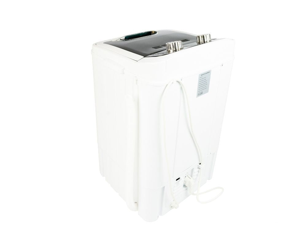 salora vaskemaskin sett akfra med slanger og ledning festet
