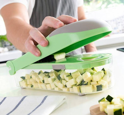 Grønnsaksskjærer, rivjern og mandolin 7 - i - 1 med tilbehør fra InnovaGoods - Fritidsshoppen.nogrønnsaksskjærerkjutkjøkken